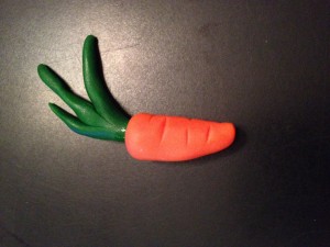 I had planned for it to be holding or munching this little carrot, but the paws were so far apart...
